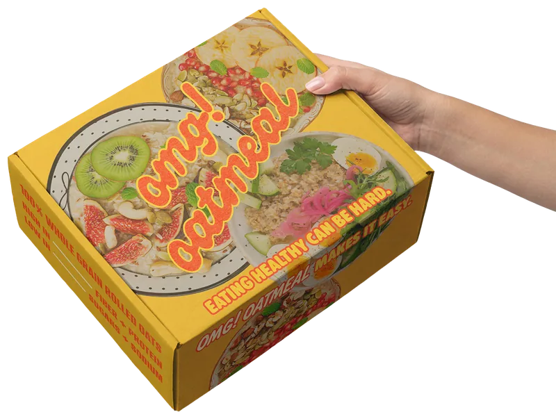 OMG! Oatmeal custom printed mailer box held in a hand